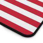 Red and white striped mat with a black border on a white background