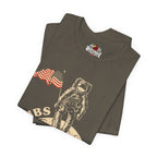 Folded t-shirt with astronaut and American flag design on a white background