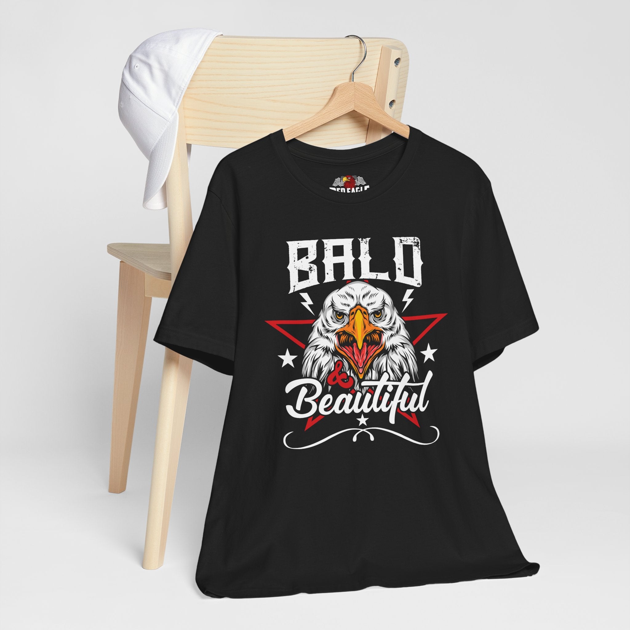 Black t-shirt with an eagle graphic and 'Bald & Beautiful' text on a white background