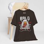 Brown t-shirt with an eagle graphic and 'Bald Beautiful' text on a white background
