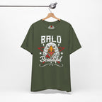 Military Green t-shirt with an eagle graphic and 'Bald is Beautiful' text on a hanger against a white background.
