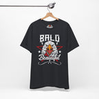 Vintage Black t-shirt with bald eagle graphic and 'Bald is Beautiful' text on a hanger against a white background.