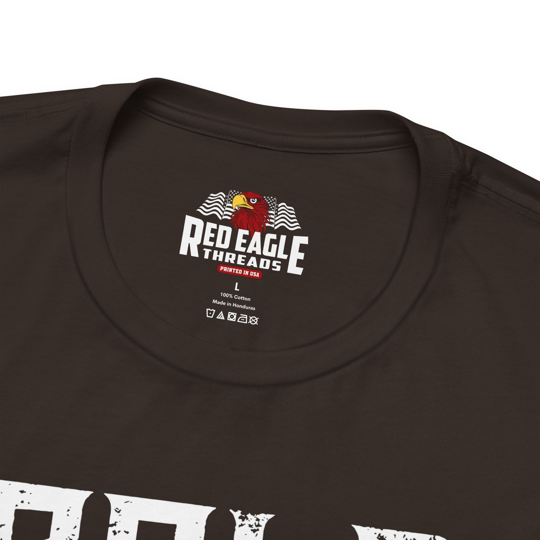 Close-up of a brown t-shirt with 'Red Eagle Threads' logo on a white background