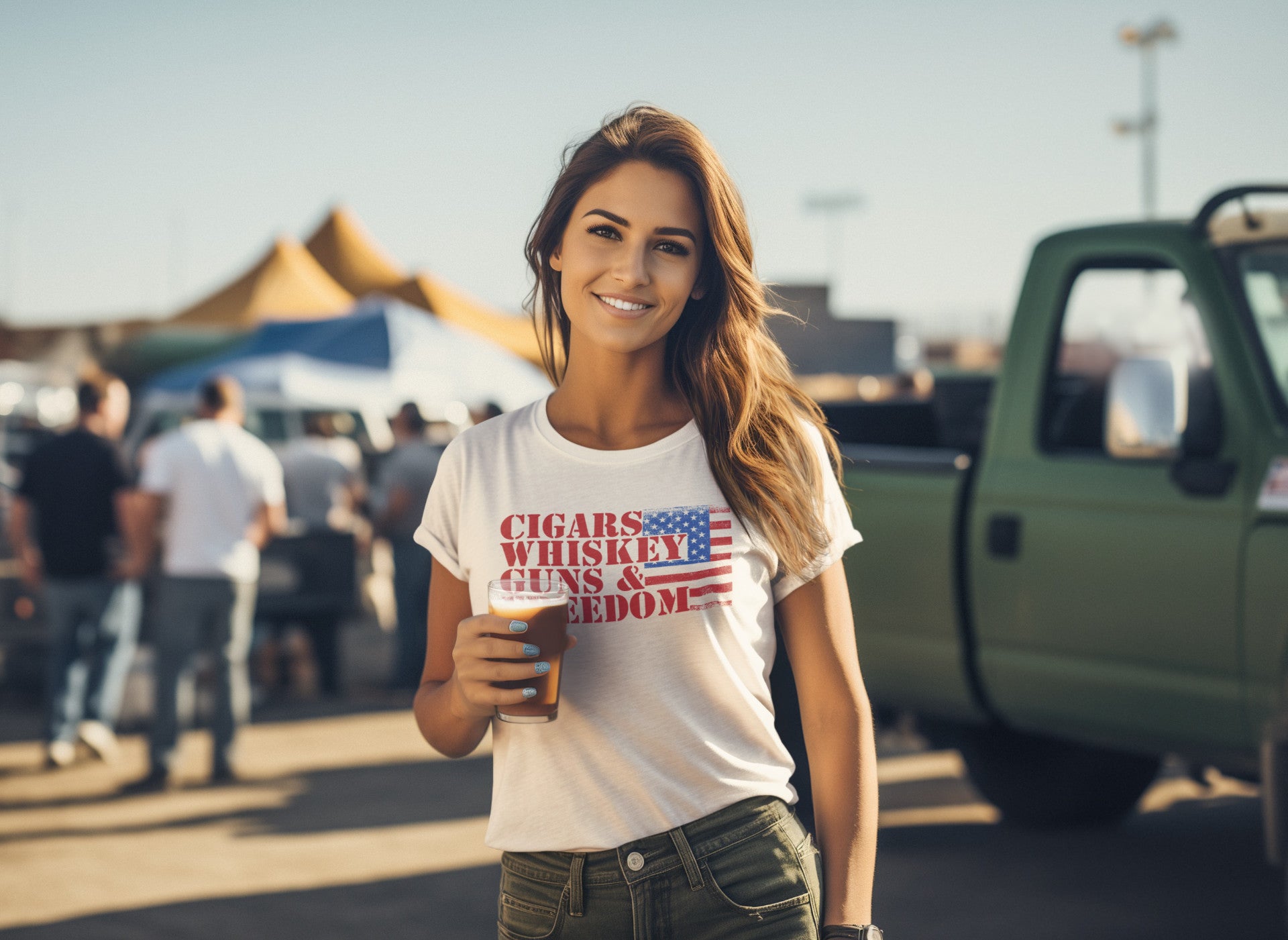 Woman wearing a t-shirt with text, holding a drink, standing outdoors with a truck and people in the background.
