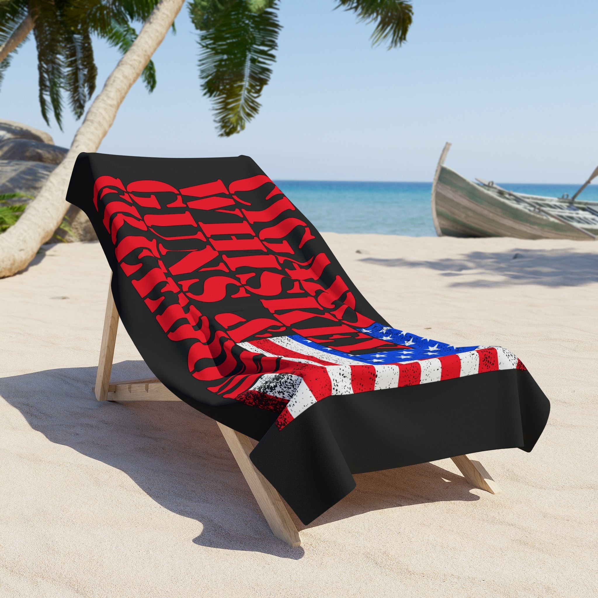 Beach towel with American flag design on a lounge chair at the beach
