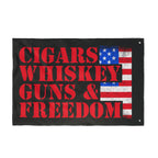 Flag with 'Cigars Whiskey Guns & Freedom' text and American flag design on a black background