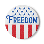 Button badge with 'FREEDOM' text and American flag design on a white background