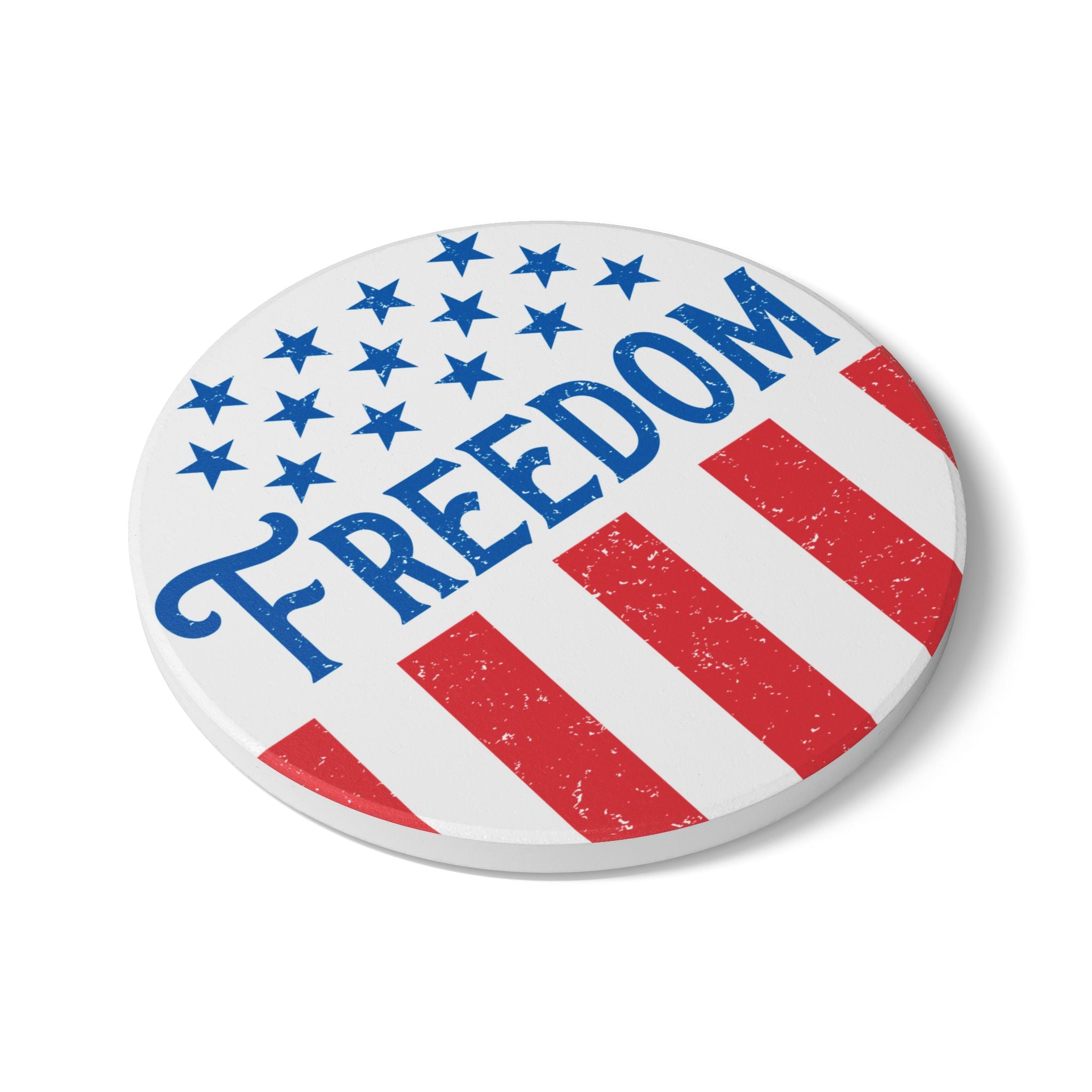 Button badge with 'FREEDOM' text and American flag design on a white background