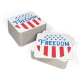 Stack of cards with 'Freedom' text and American flag design on a white background