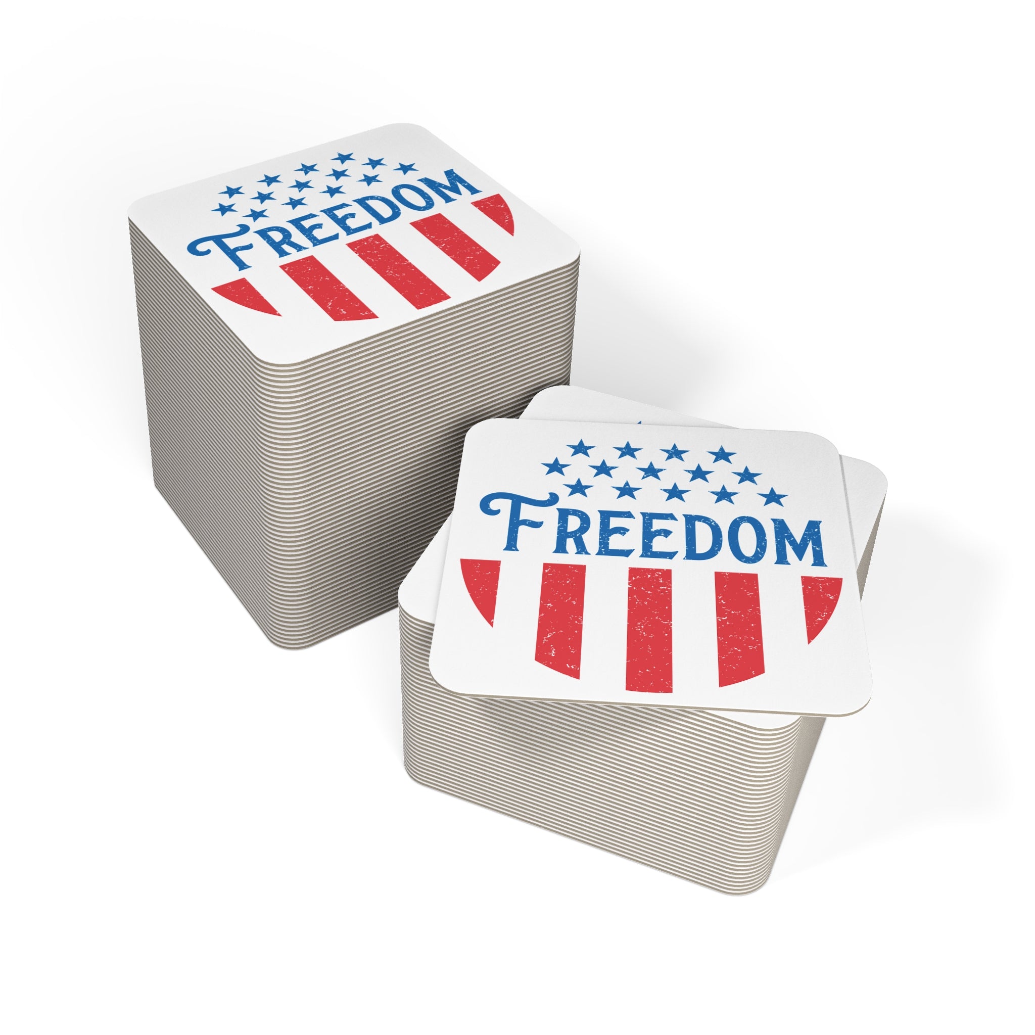 Stacks of coasters with 'Freedom' and American flag design on a white background