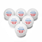 Set of six white balls with 'Freedom' text and American flag design on a white background