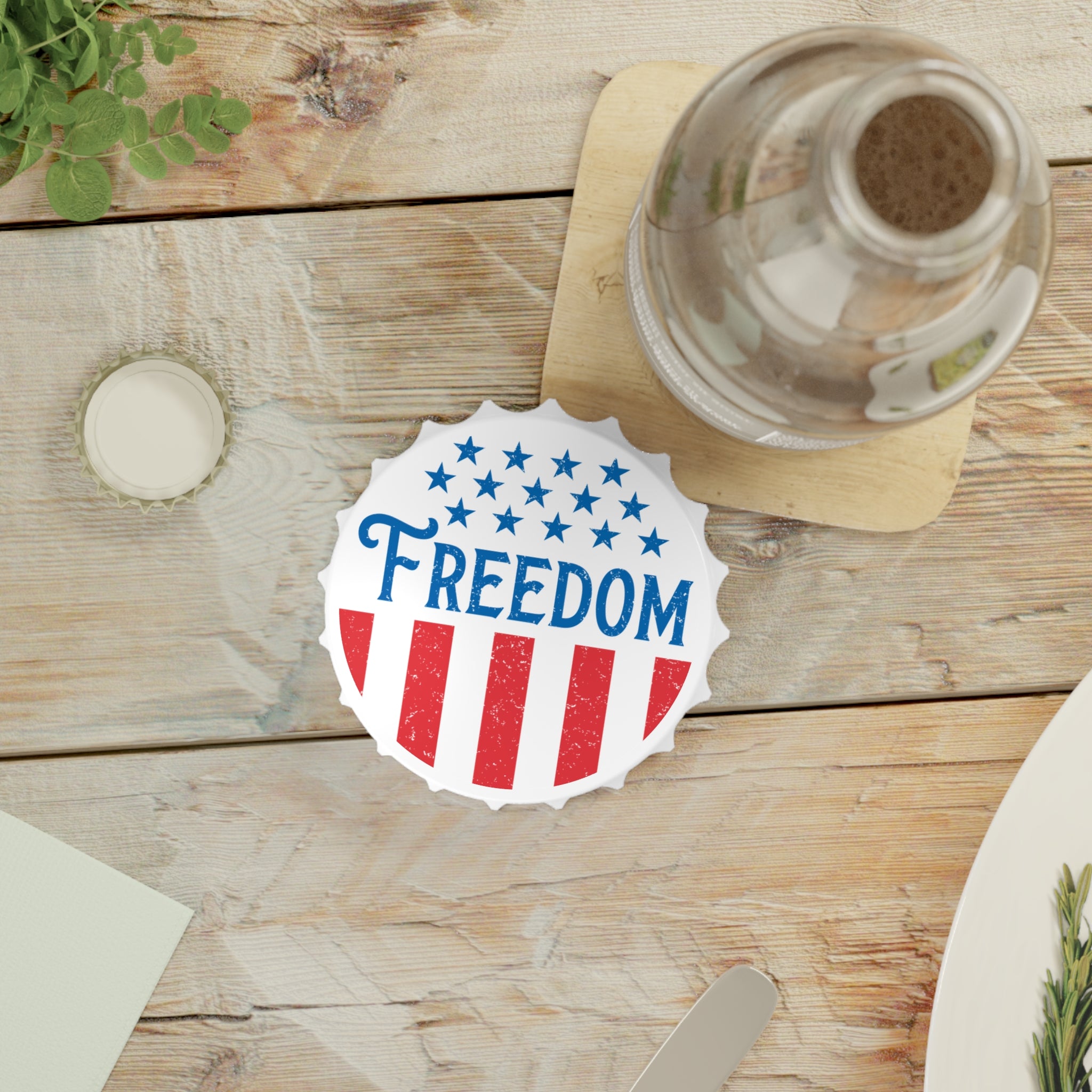 Coaster with 'FREEDOM' design on a wooden table