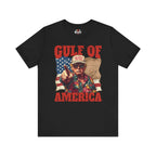 Black t-shirt with graphic design featuring a person pointing and 'Gulf of America' text on a white background