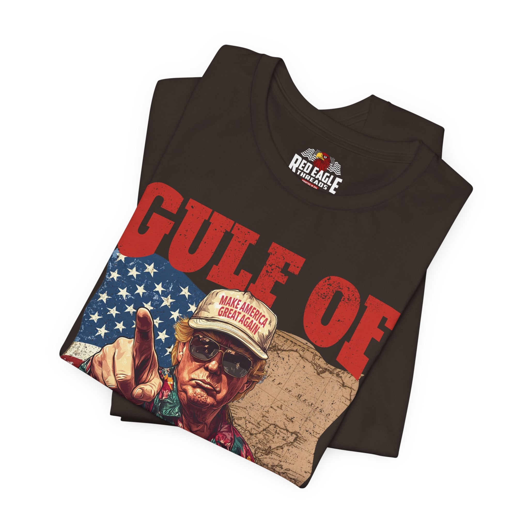 Folded t-shirt with graphic design and 'Red Eagle' branding on a white background