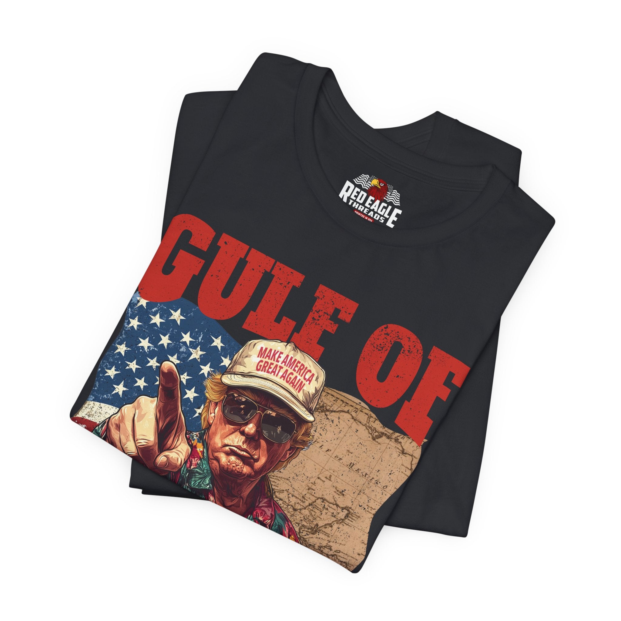 Folded vintage black t-shirt with graphic design and 'Red Eagle' branding on a white background