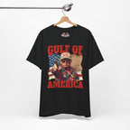 Black t-shirt with graphic design and text 'Gulf of America' on a hanger against a white background