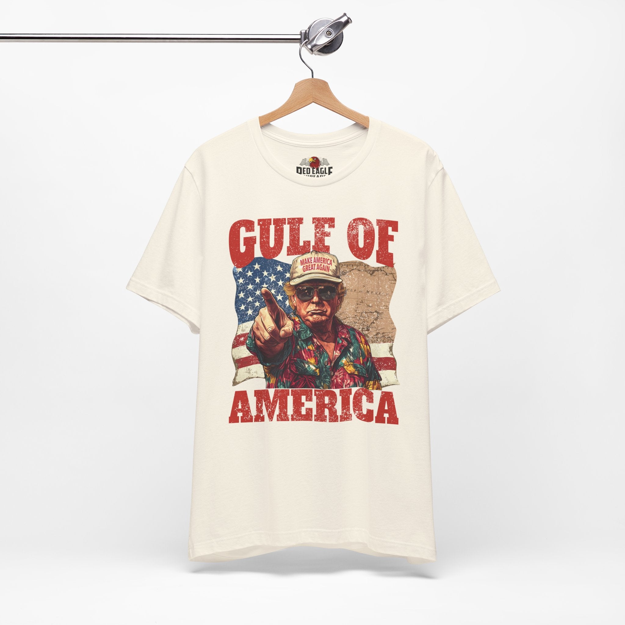 T-shirt with graphic design and text on a hanger against a white background