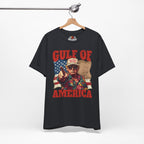 Vintage Black t-shirt with graphic design featuring a person and 'Gulf of America' text on a hanger against a white background.