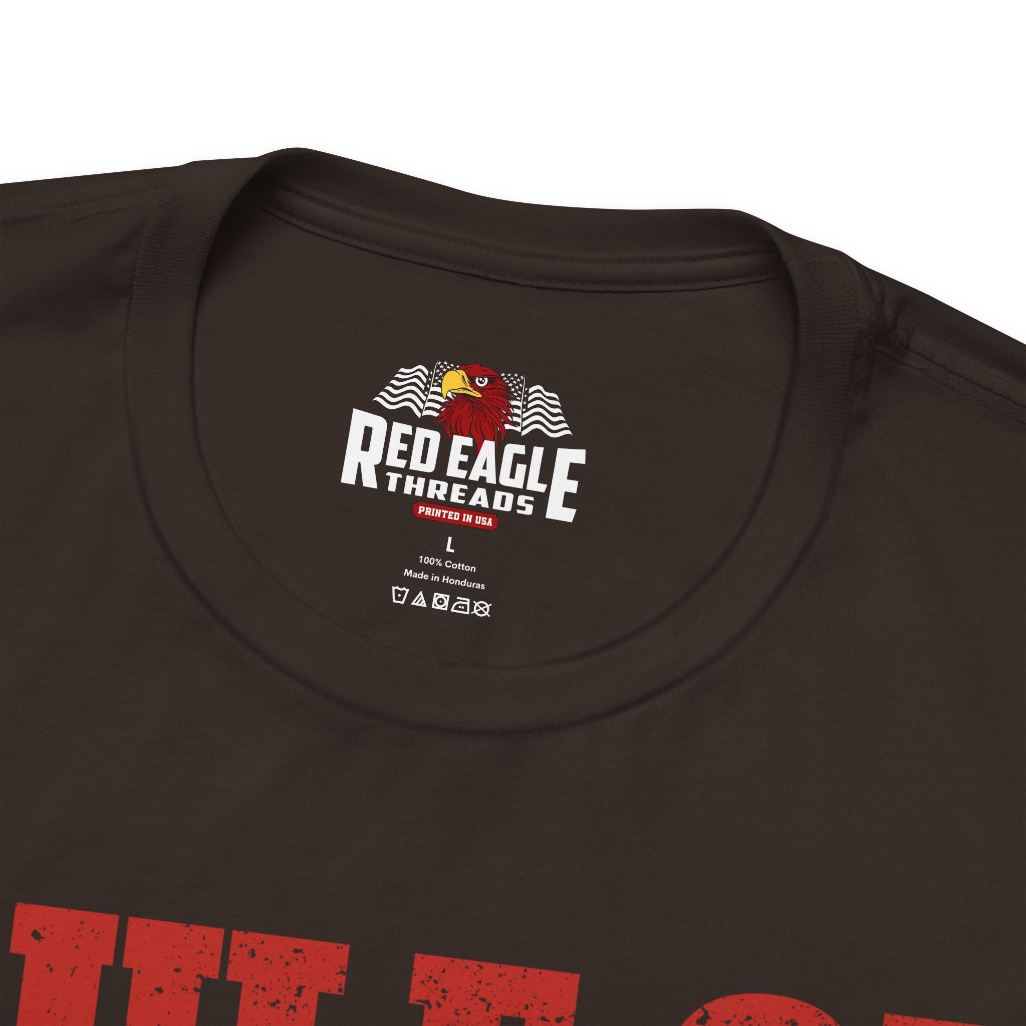 Close-up of a dark brown t-shirt with 'Red Eagle Threads' logo on the chest.
