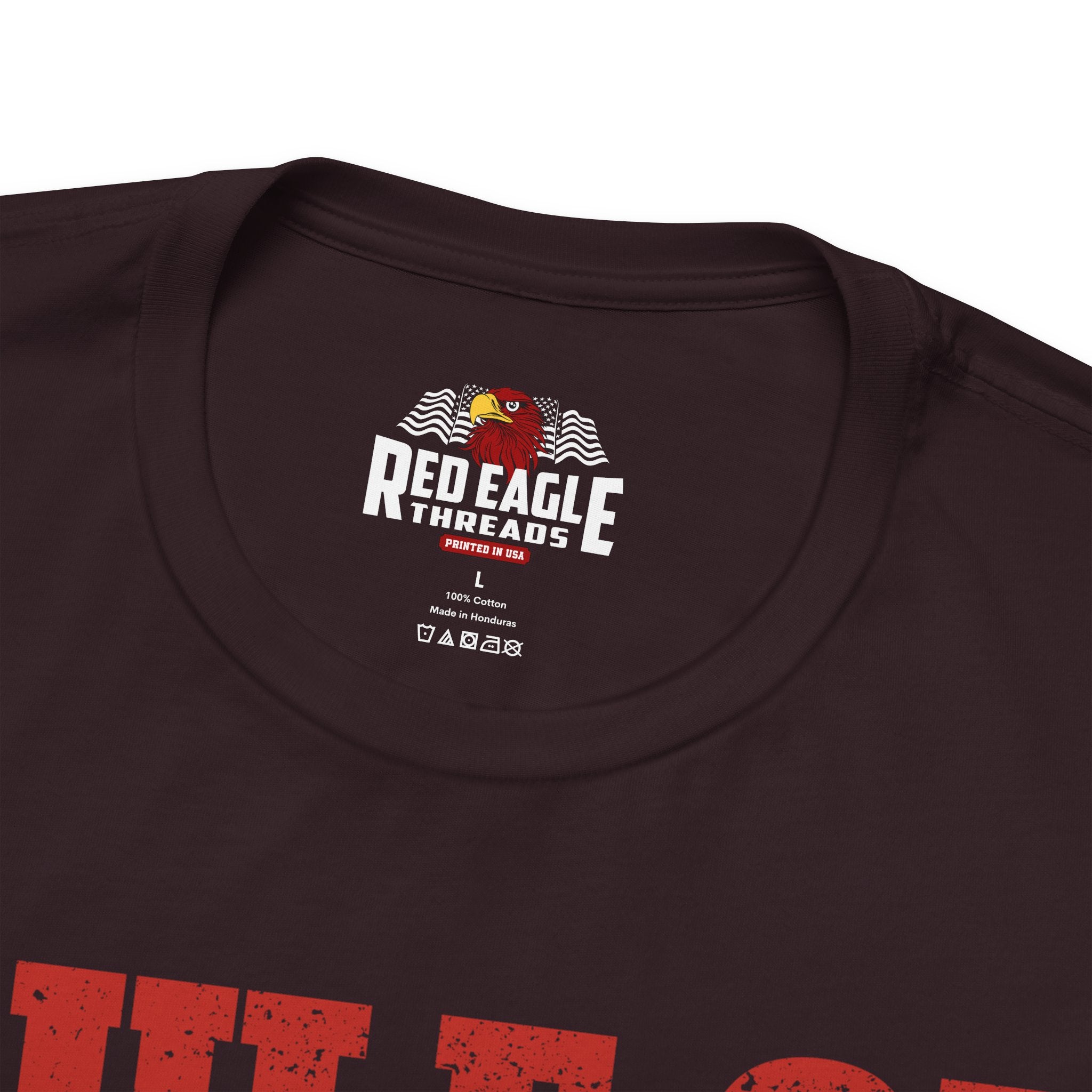 Close-up of a oxblood black t-shirt with 'Red Eagle Threads' logo and text.