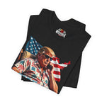 Folded black t-shirt with a graphic of a person holding a phone in front of an American flag.