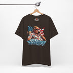 Brown t-shirt with graphic design of a person holding an American flag, labeled 'Gulf of America', on a hanger against a white background.