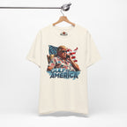 Natural t-shirt with graphic design on a hanger against a white background