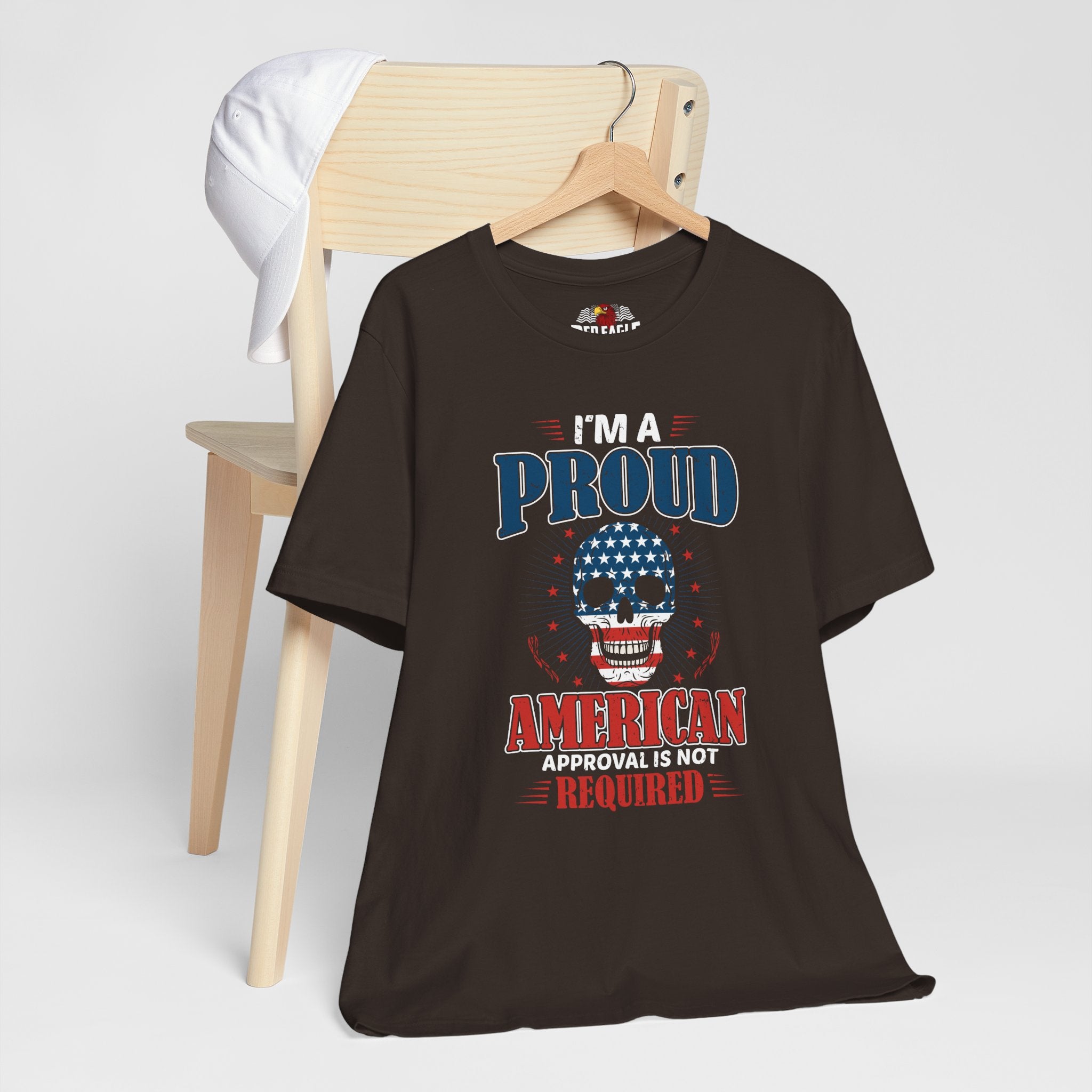 Brown t-shirt with a graphic design and text on a white background