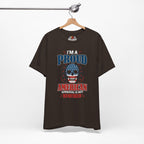 Brown t-shirt with a graphic design on a hanger against a white background