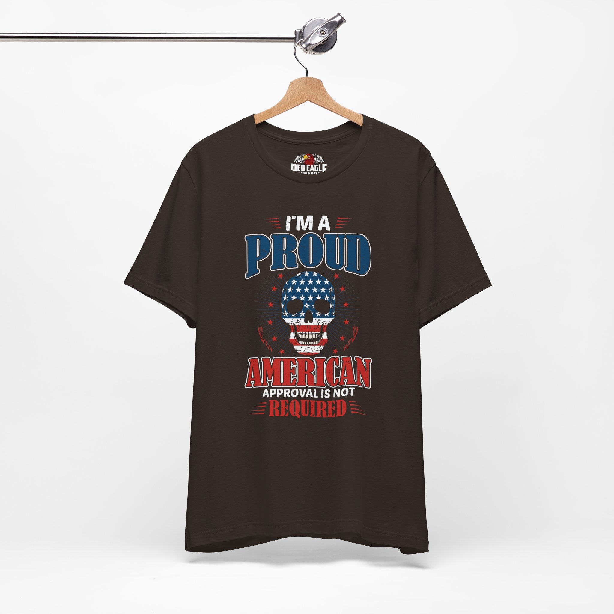 Brown t-shirt with a graphic design on a hanger against a white background