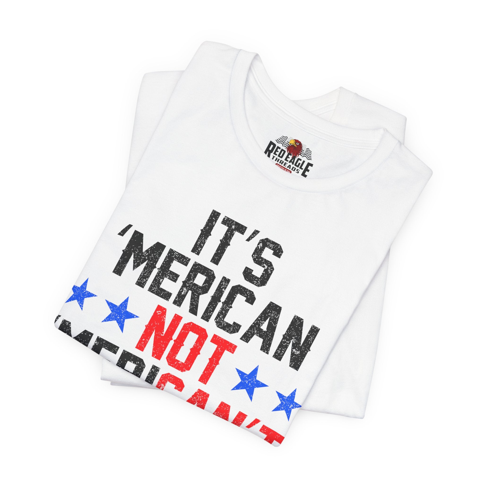 White t-shirt with 'It's American Not American' text and Red Bull logo on a white background