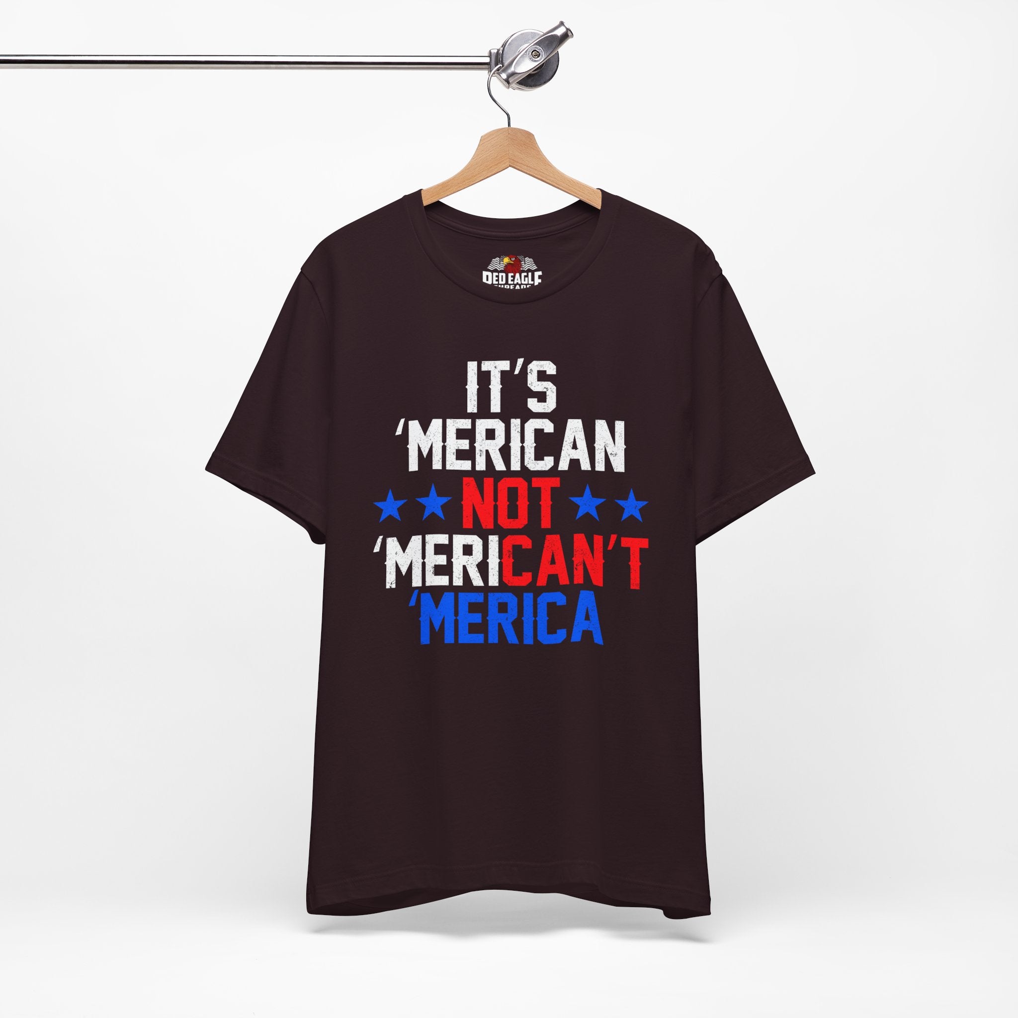 Oxblood Black t-shirt with colorful text on a hanger against a white background