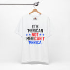 White t-shirt with colorful text on a hanger against a white background