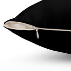 Black pillow with a zipper on a white background