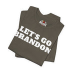 Folded army green t-shirt with 'Let's Go Brandon' text and Red Eagle logo on a white background