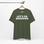 Military Green t-shirt with 'LET'S GO BRANDON' text on a hanger against a white background