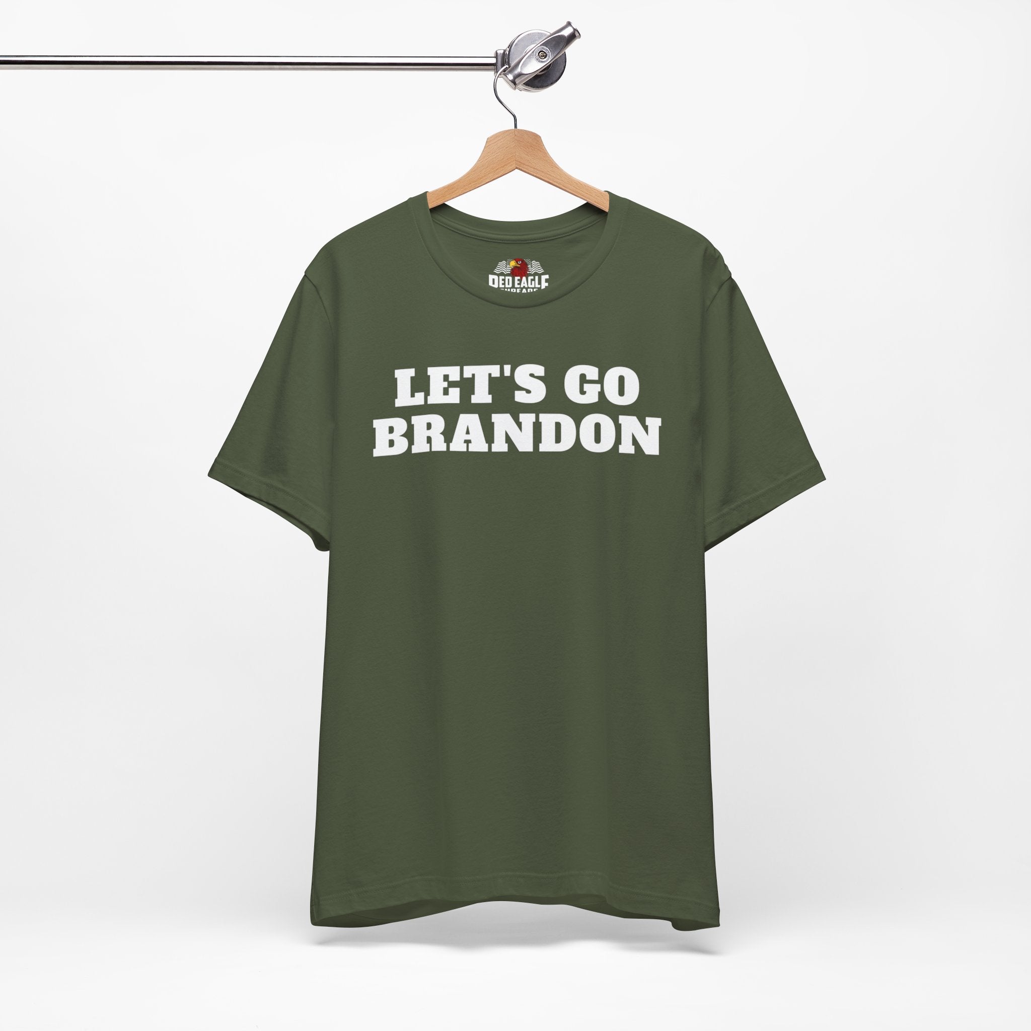 Military Green t-shirt with 'LET'S GO BRANDON' text on a hanger against a white background