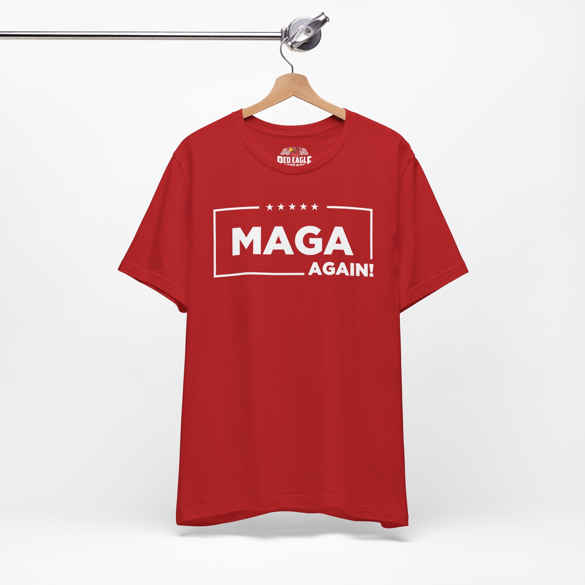 Red t-shirt with 'MAGA AGAIN!' text on a hanger against a white background