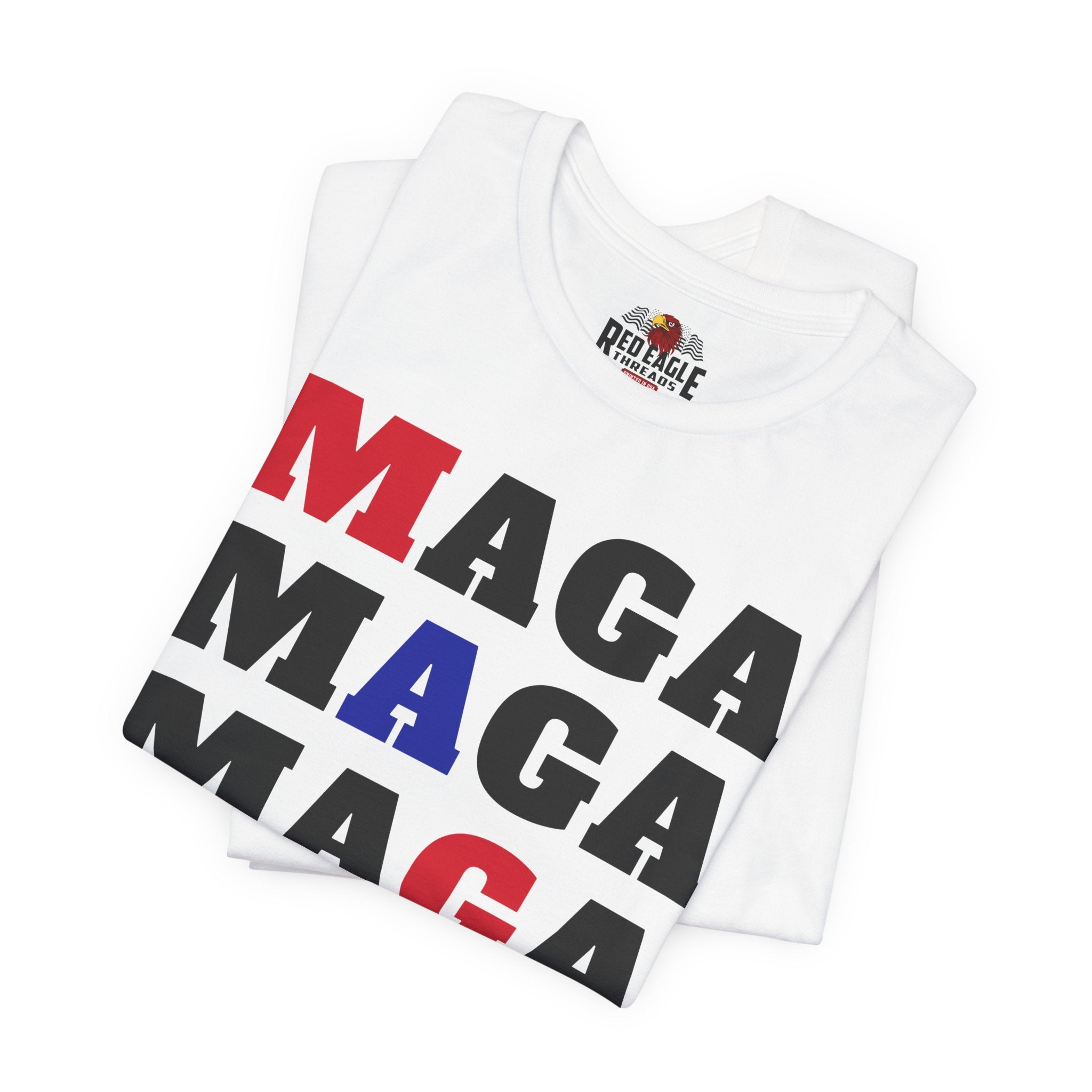 White t-shirt with 'MAGA' printed in red, black, and blue on a white background