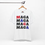 White t-shirt with 'MAGA' text in red, blue, and black on a hanger.