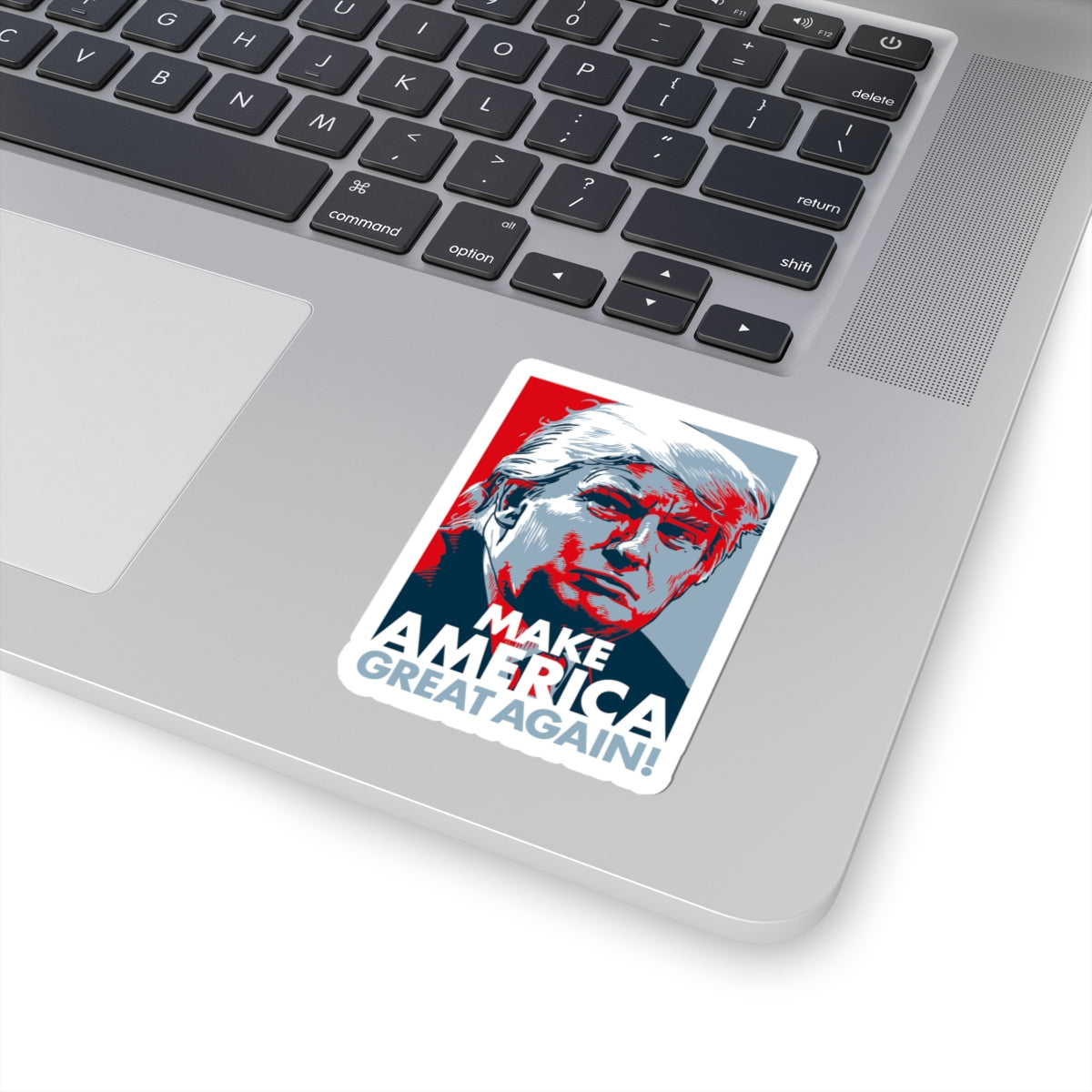 Laptop with a 'Make America Great Again!' sticker on the palm rest area