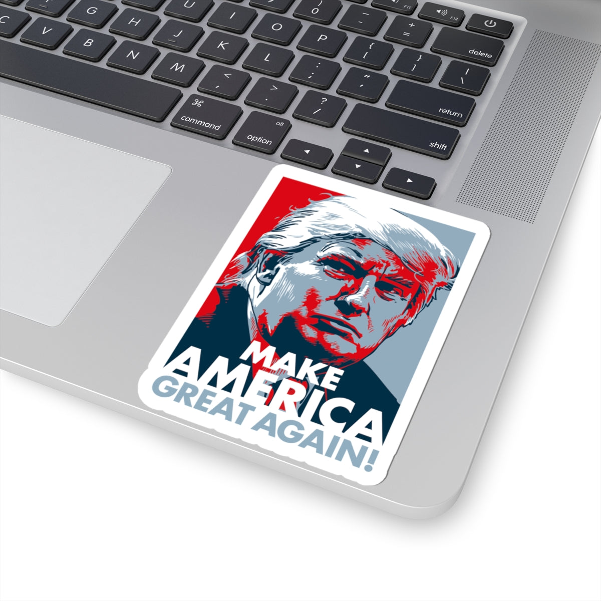 Cutout sticker with a political message on a laptop
