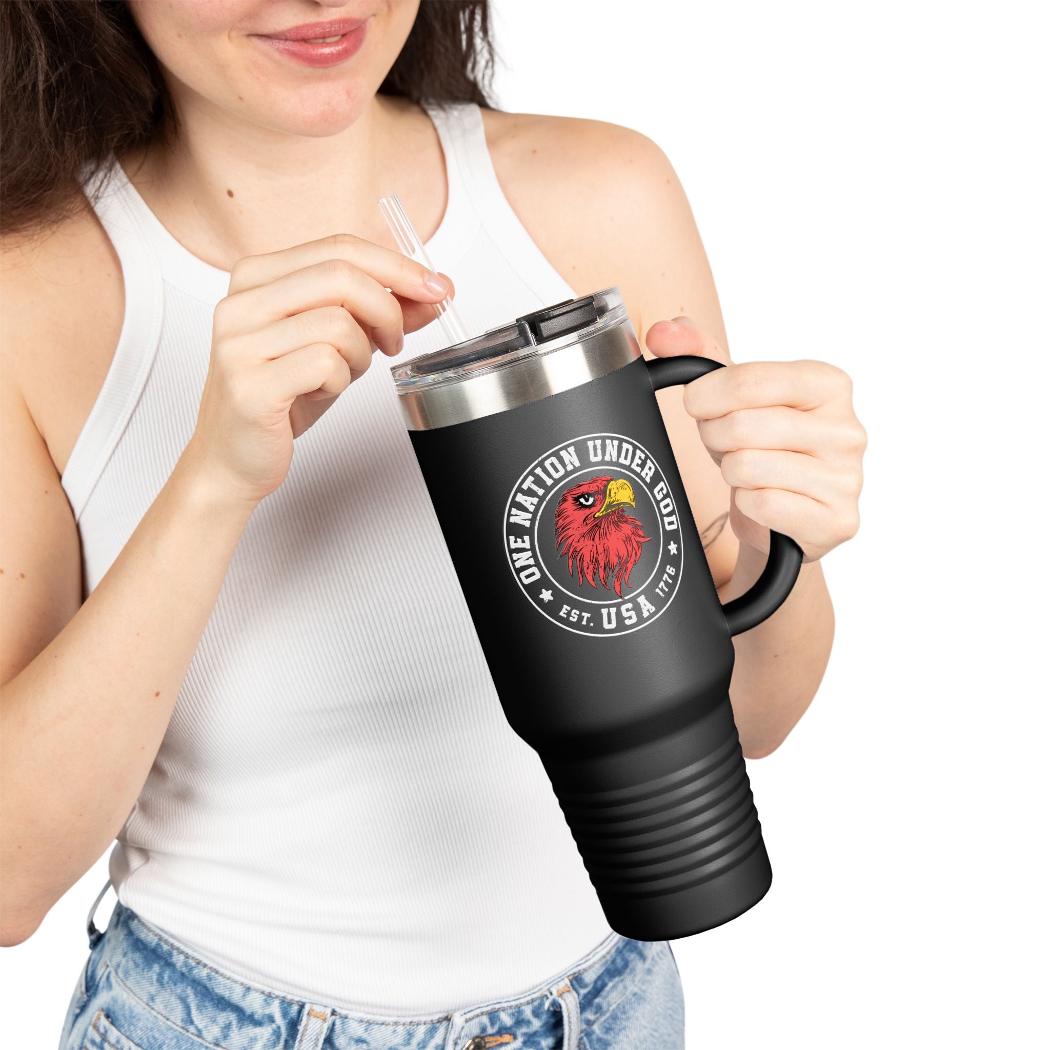 Person holding a black travel mug with a logo and text on a white background