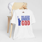 White t-shirt with 'One Nation Under God' graphic on a wooden chair against a white background