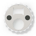 Back of a bottle opener fridge magnet on a white background