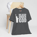 Asphalt t-shirt with 'One Nation Under God' graphic on a wooden chair against a white background