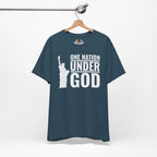 Deep teal t-shirt with 'One Nation Under God' text and Statue of Liberty graphic on a hanger.