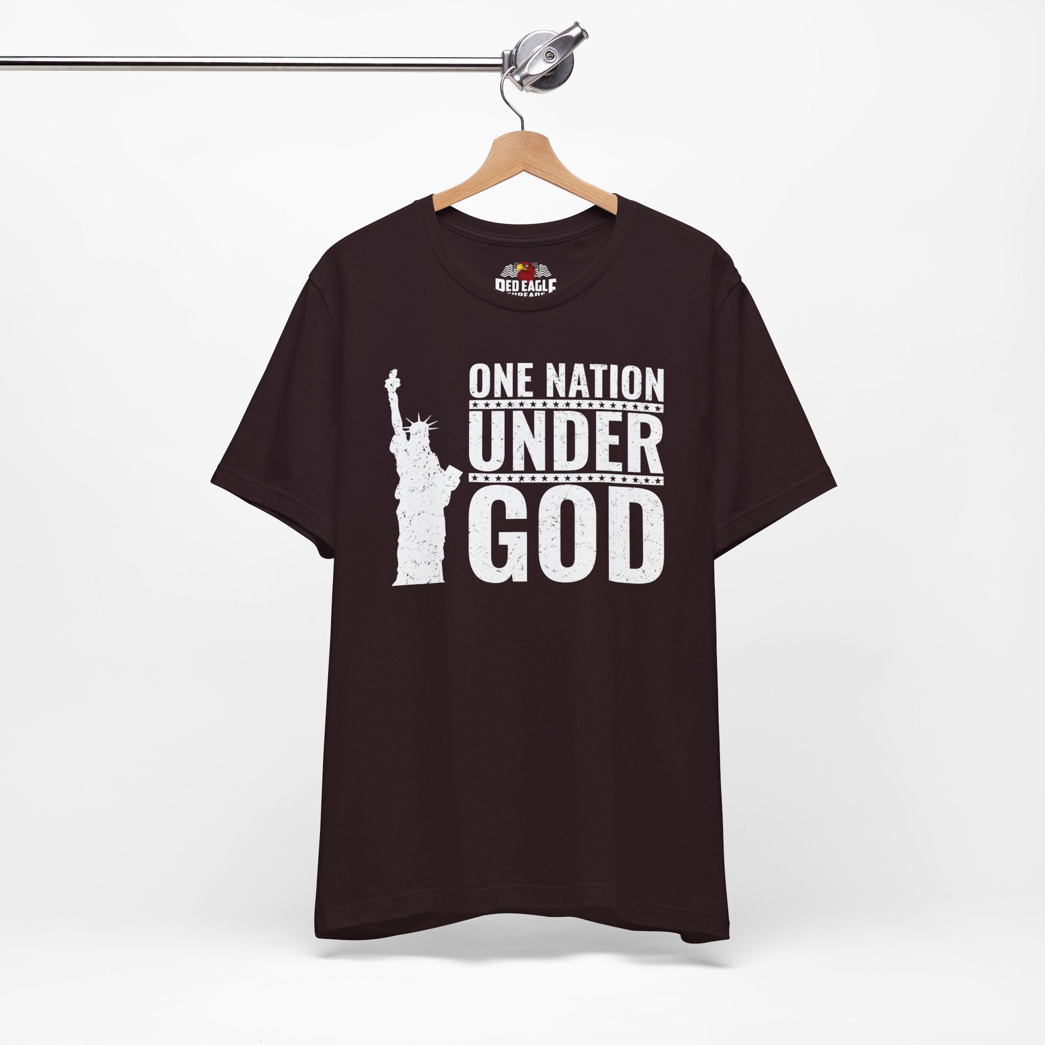 Oxblood Black t-shirt with 'One Nation Under God' graphic on a hanger against a white background