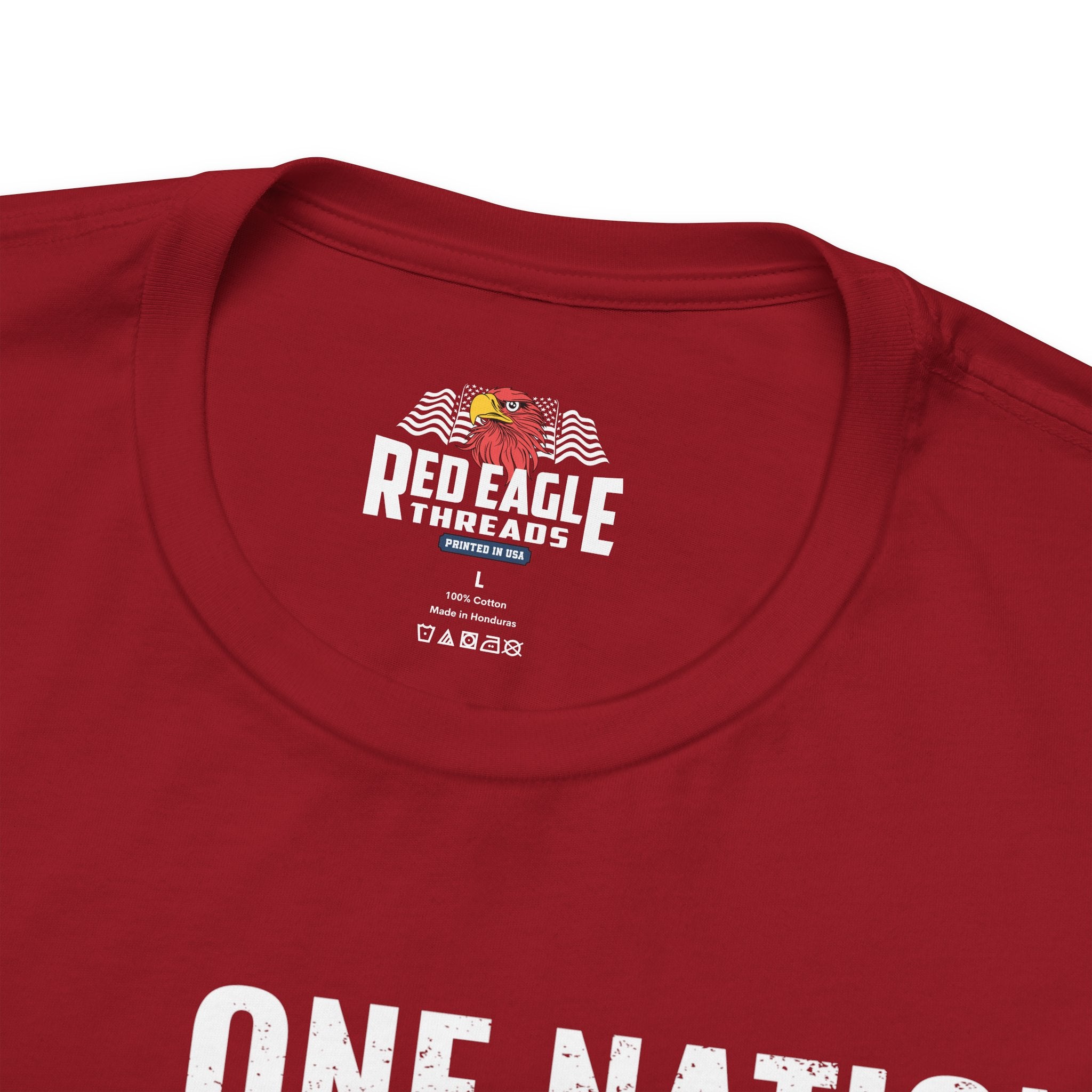 Red t-shirt with 'Red Eagle Treads' logo and text on a white background