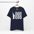 Navy blue t-shirt with 'One Nation Under God' graphic on a hanger against a white background